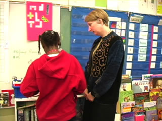 teacher with student