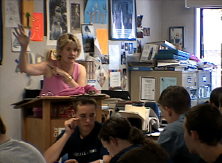 teacher at podium