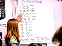 student at board