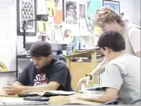 small groups working, teacher checks