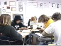 small groups working, teacher checks
