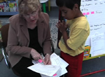 student with teacher
